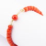 Blood coral bracelet with gold clasp