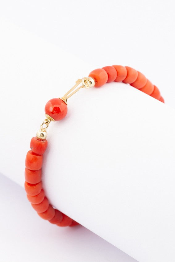 Blood coral bracelet with gold clasp