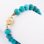 Turkoois armband met gouden sluiting