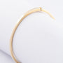 White/yellow gold bangle with a brilliant