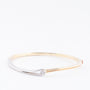 White/yellow gold bangle with a brilliant