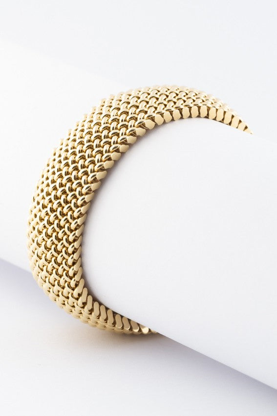 Golden braided bracelet.