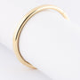 Gouden bangle armband met scharnier sluiting