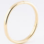 Gouden bangle armband met scharnier sluiting