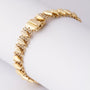 Gouden schakel armband met filigrain