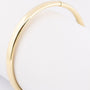 Gouden bangle met scharnier sluiting (grote maat)
