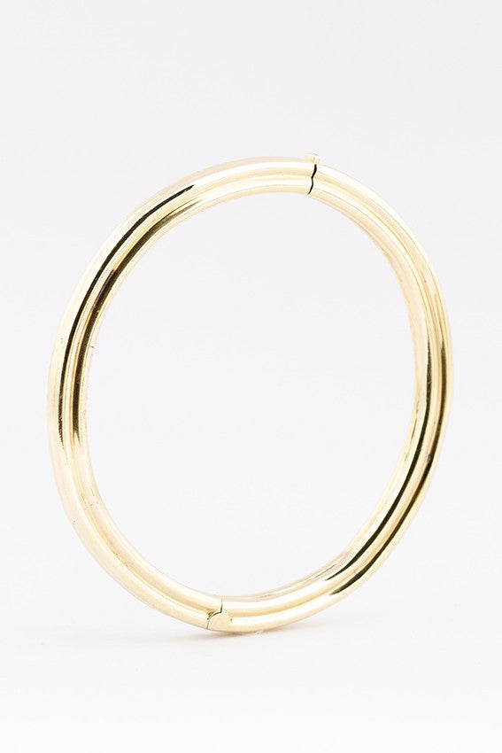 Gouden bangle met scharnier sluiting