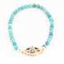 Turkoois armband aan gouden sluiting met granaat en turkoois
