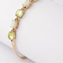 Gouden armband met opalen en peridoot