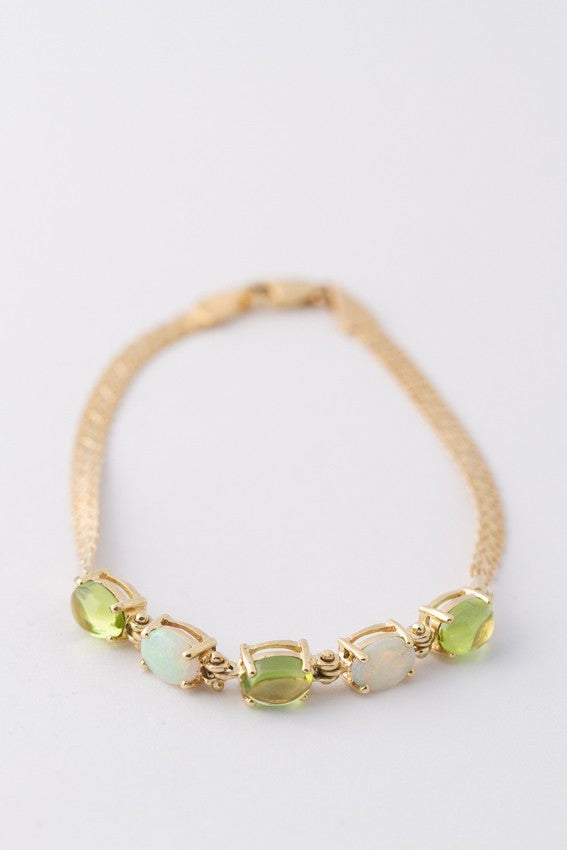 Gouden armband met opalen en peridoot