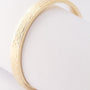 Gold bangle with hinged closure