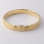 Gold bangle with hinged closure