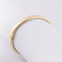Gouden bangle met scharniersluiting