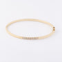 Gouden armband met 8 briljanten en scharnier sluiting