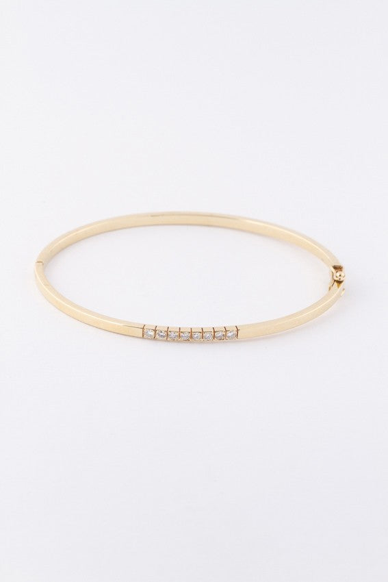 Gouden armband met 8 briljanten en scharnier sluiting