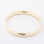 Gold bangle with hinge closure