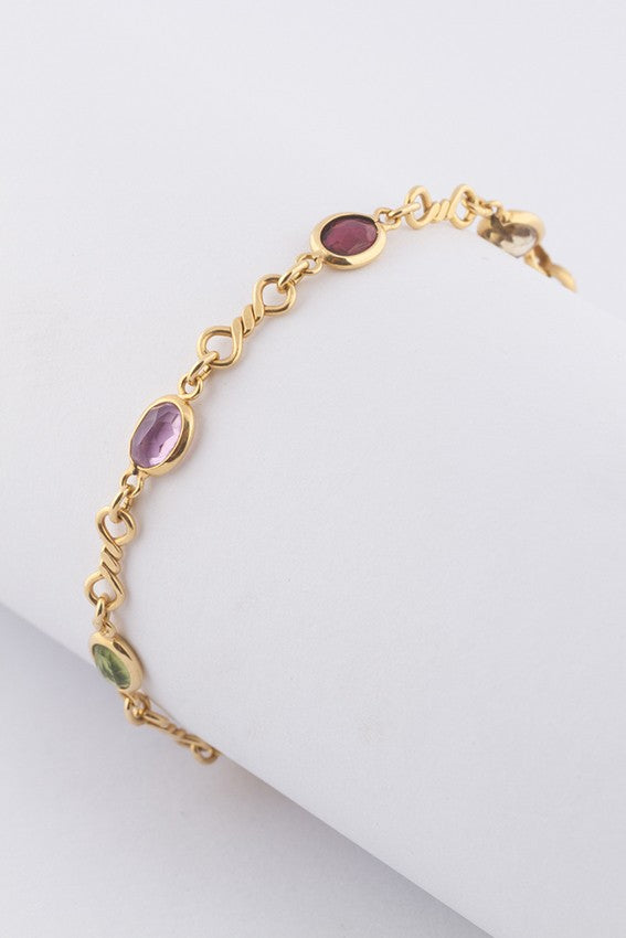 Gouden schakel armband met diverse edelstenen