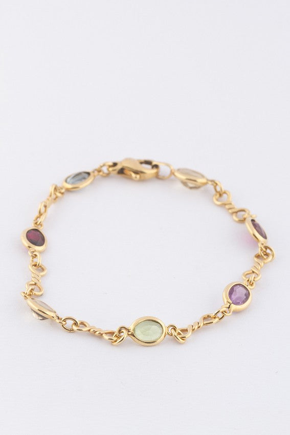 Gouden schakel armband met diverse edelstenen