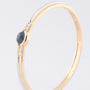 White/yellow gold bangle from the Le Chic brand with sapphire and diamonds
