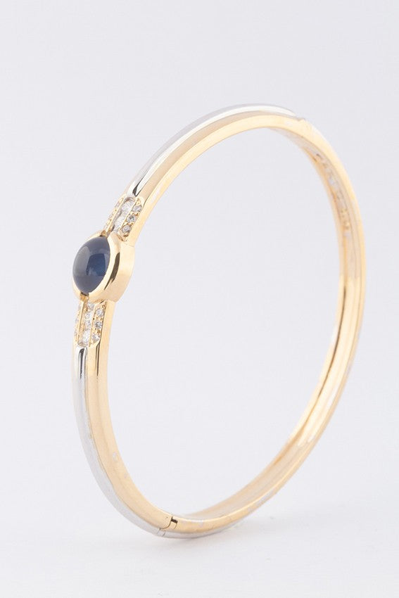 White/yellow gold bangle from the Le Chic brand with sapphire and diamonds