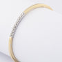 Gouden bangle met briljanten