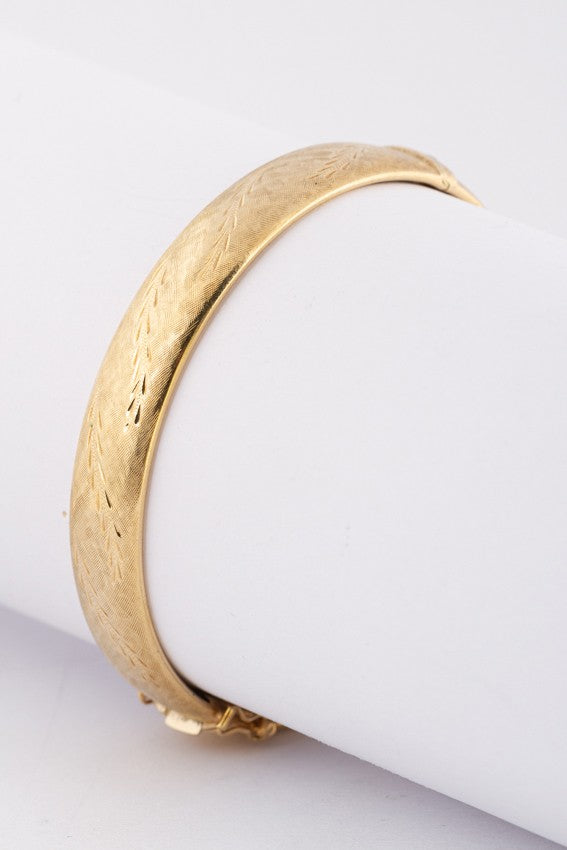 Gold engraved bangle