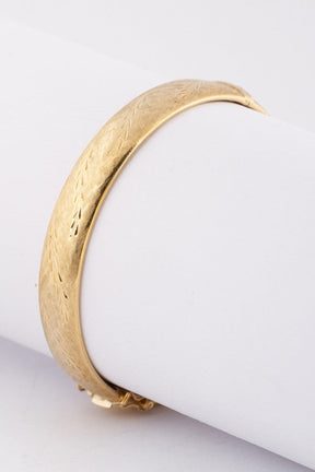 Gold engraved bangle