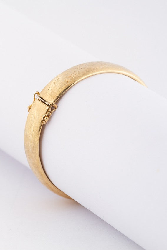 Gold engraved bangle