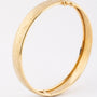 Gold engraved bangle