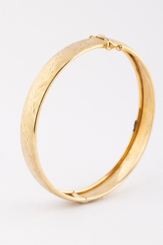 Gold engraved bangle