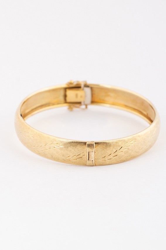 Gold engraved bangle