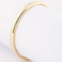 Gold bangle with hinged closure