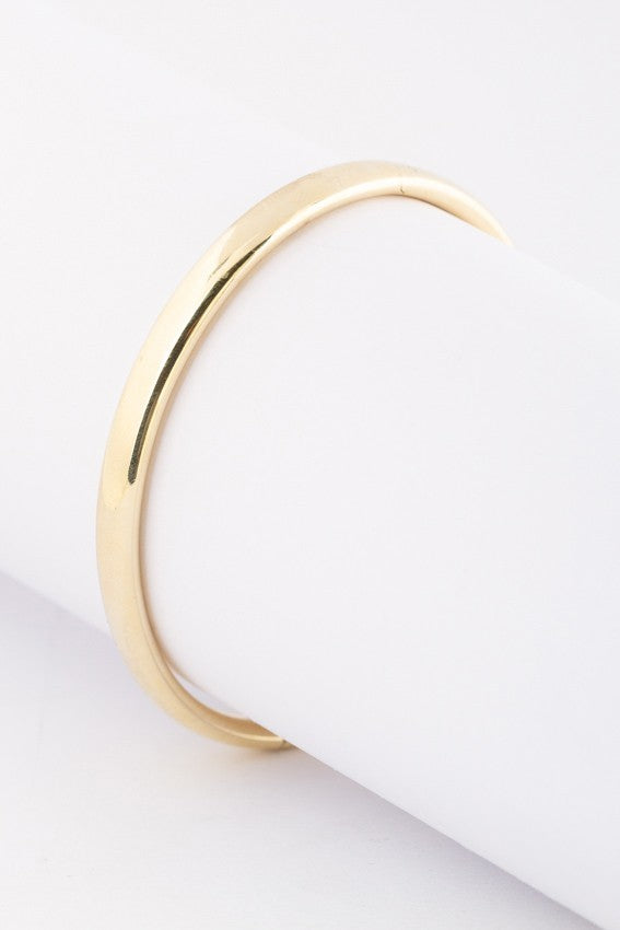 Gold bangle with hinge closure