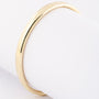 Gouden bangle met scharnier sluiting