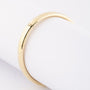 Gouden bangle met scharnier sluiting