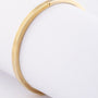 White/yellow gold matte bangle with hinge closure