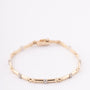 Gold link bracelet with 7 diamonds