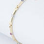 Gold link bracelet with emeralds, rubies, sapphires and diamonds