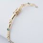 Gold link bracelet with emeralds, rubies, sapphires and diamonds