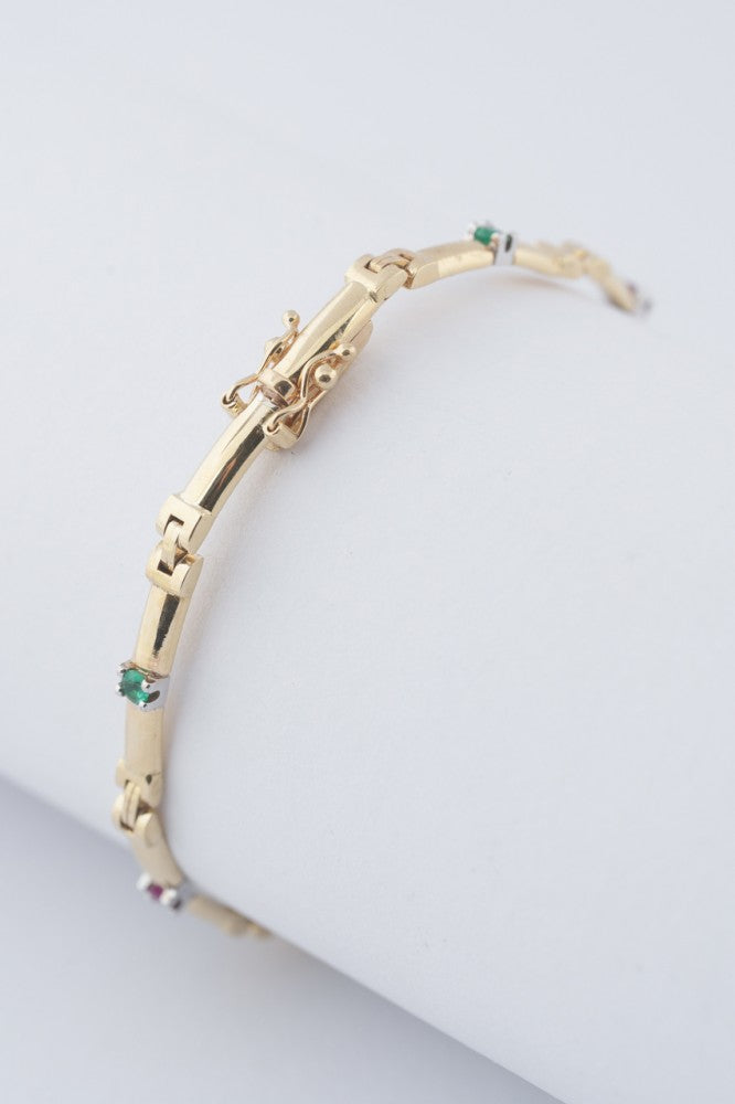 Gold link bracelet with emeralds, rubies, sapphires and diamonds