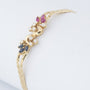 Gold bracelet with sapphire, ruby ​​and 8 diamonds