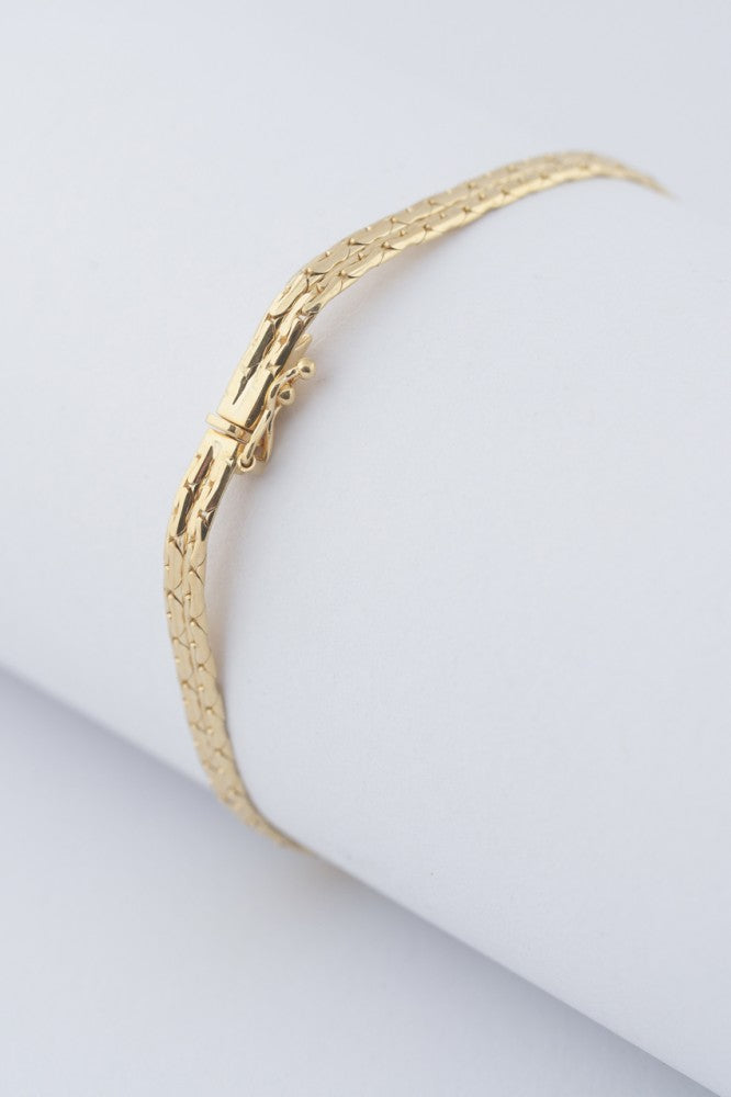 Gold bracelet with sapphire, ruby ​​and 8 diamonds