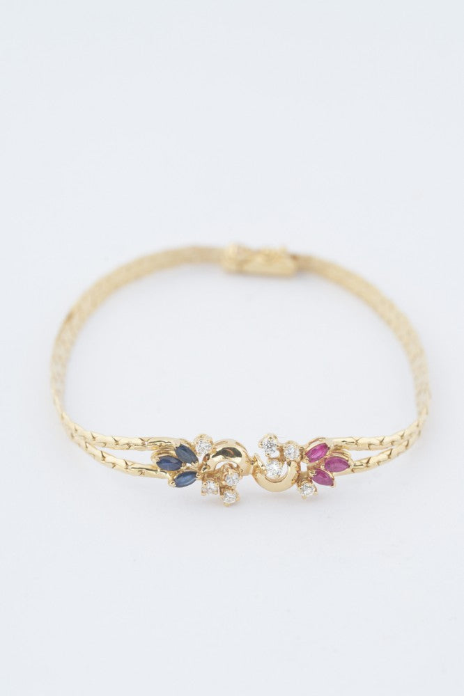 Gold bracelet with sapphire, ruby ​​and 8 diamonds