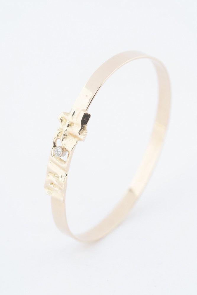 Gouden bangle met een briljant met Meesterteken P. vd Hout