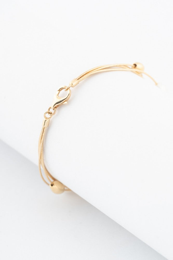 Gold lake strand bracelet with freshwater pearls