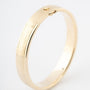 Gold bangle with hinge closure