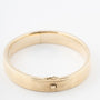 Gold bangle with hinge closure