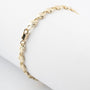 Solid gold shell link bracelet