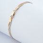 White/yellow gold braided bracelet
