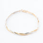 White/yellow gold braided bracelet